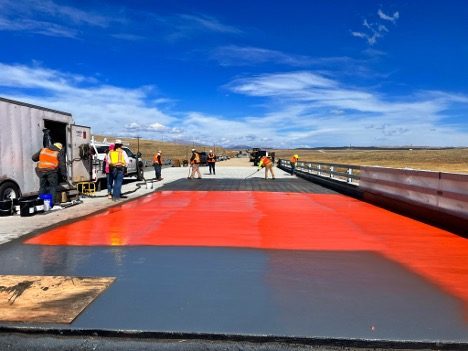 Spray-applied bridge deck waterproofing on US 285 over the South Platte River